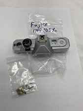 Fujica MPF105Xn camera top with hardware and battery slotted cover