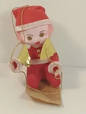 🎄 1972 Vintage Red Flocked Christmas Gold Foil Winged Angle On Sled Ornament 🎄