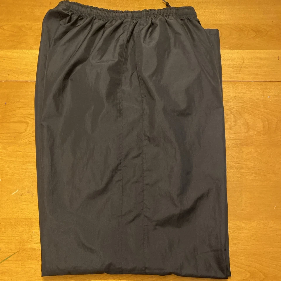 Pantalones de chándal para hombre Nike Spellout negros etiquetas faltantes cremallera tobillo talla mediana Foto 4 de 4