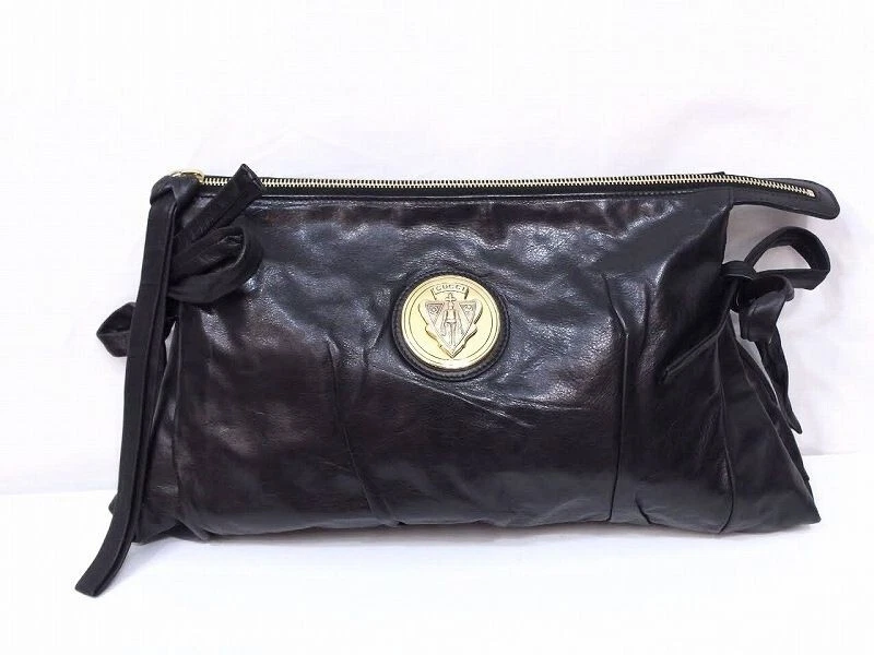 Sac pochette GUCCI Hysteria en cuir verni motif écusson noir avec sac de rangement