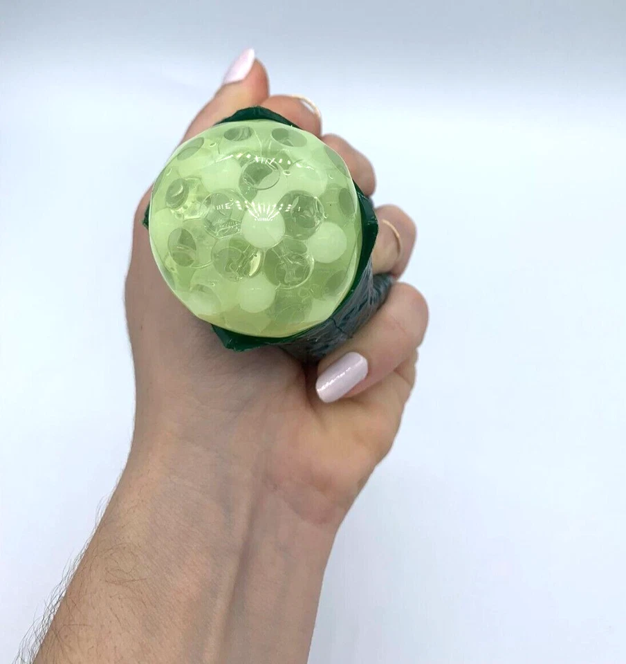 juguete blando verde oscuro y verde claro Foto 3 de 4