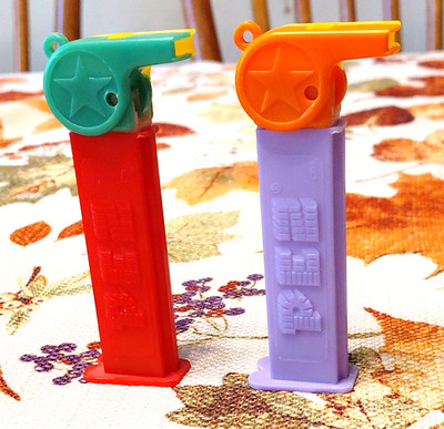 PEZ Candy Dispensers Lot of 2 Star Top Yellow/Green & Yellow/Orange Red/Purple