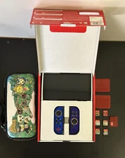 Nintendo Switch OLED BUNDLE WITH GAMES