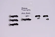 LOT OF (7) GLOCK 23 OEM PARTS, MAGAZINE RELEASE & EXT , SIGHTS, TRIGGER SPRING
