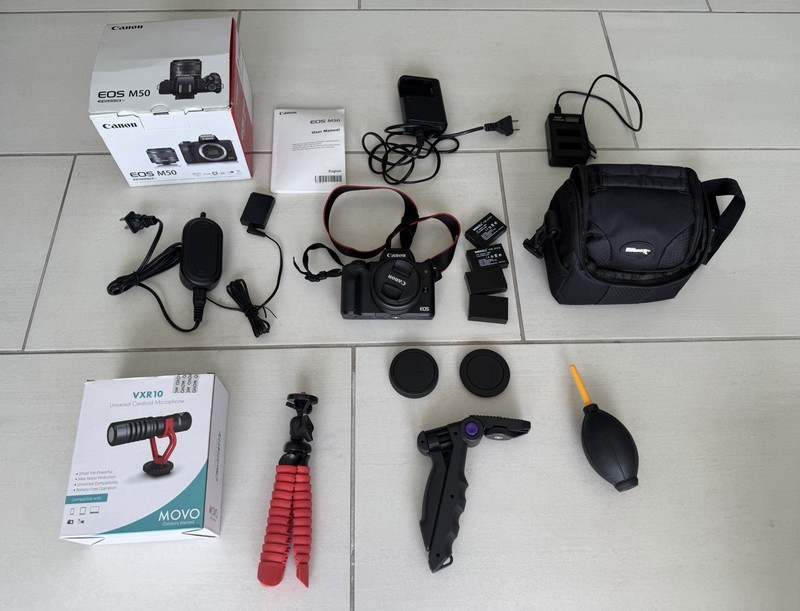 Canon EOS M50 Bundle with Lens, Movo VXR10 Microphone, Batteries, Charger, Bag