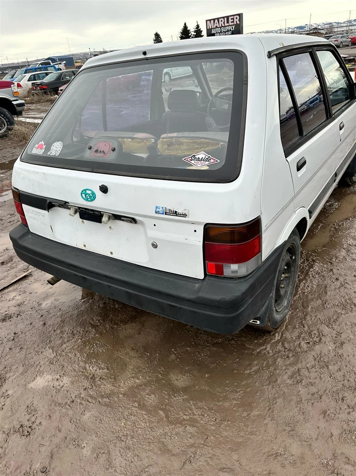 Pinza de freno de disco delantera izquierda usada se adapta a: 1990 Subaru Justy delantero GL delantero izquierdo G Foto 2 de 4