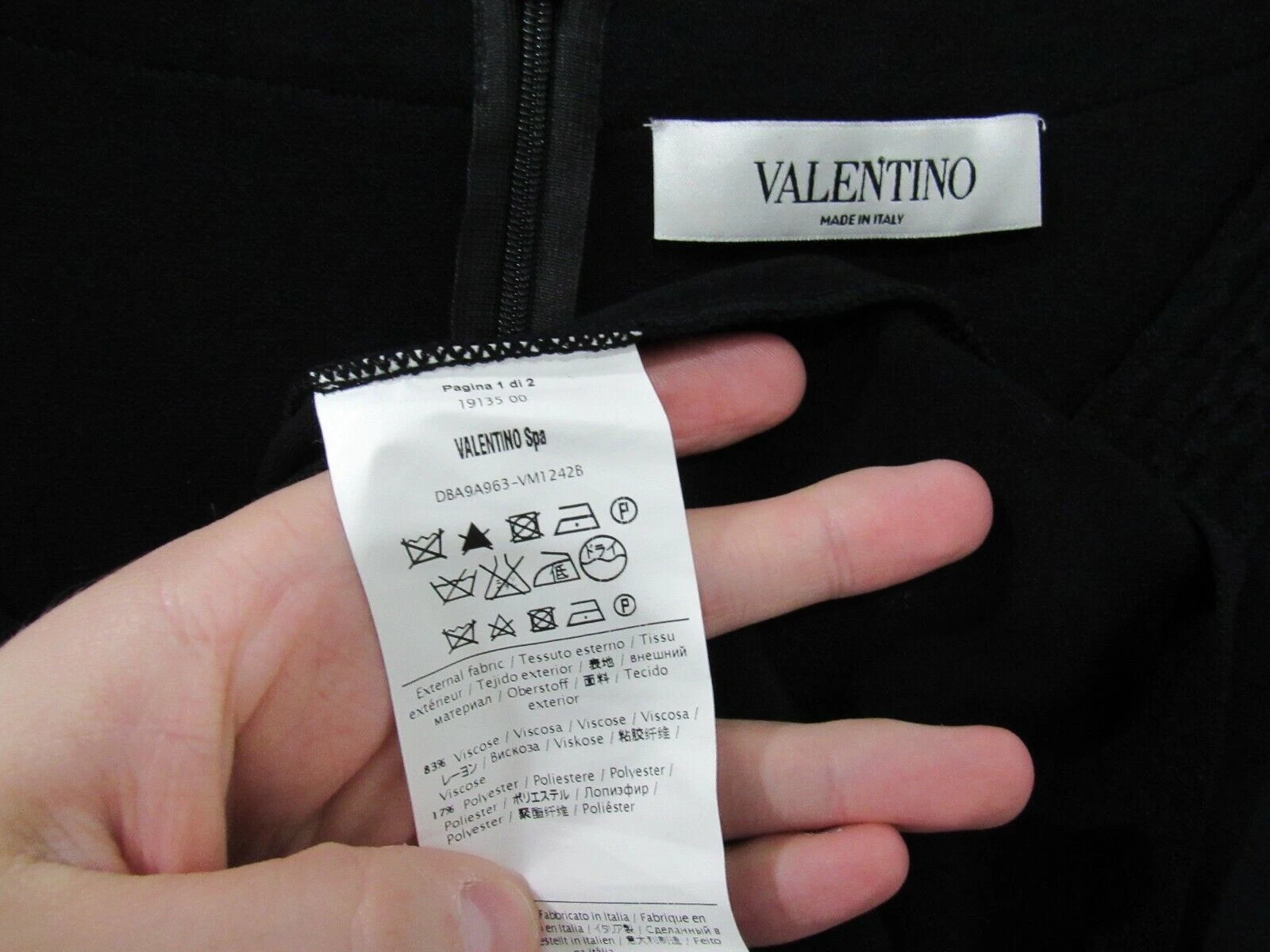 Abito Valentino nero in maglia $3.400 elasticizzato viscosa orlo broccato aderente e svasato L