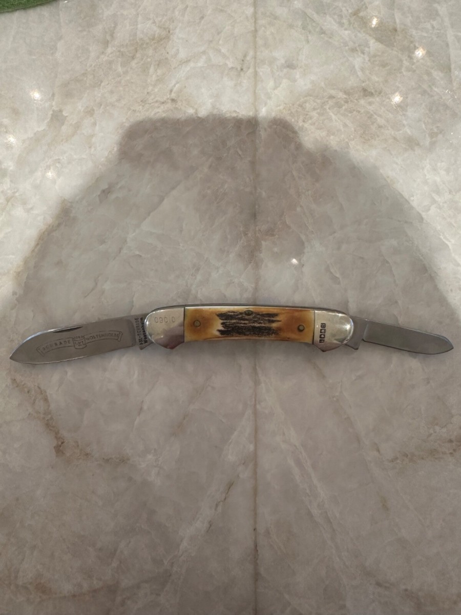 I-XL SCHRADE WOSTENHOLM STAG CANOE W/HALLMARKS ON BOLSTER