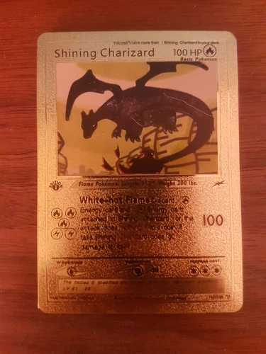 pokemon card gold shining charizard 1st edition in decent good condition. 
