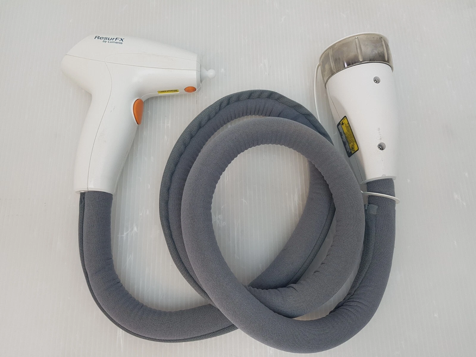 ResurFX by Lumenis handpiece with grey umbilical cable and console connector