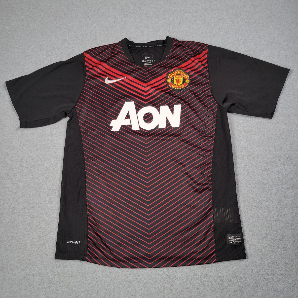 Preços baixos em Equipe Nacional Nike Manchester United Camisas de