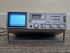 Vintage 1983 Sanyo Model TPM 2770, 2" Transistor Micro TV, Radio with Clock 