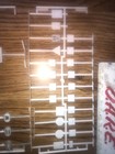 Over 70 Traffic and Railroad signs cast in white plastic, some still in the bag — photo 3