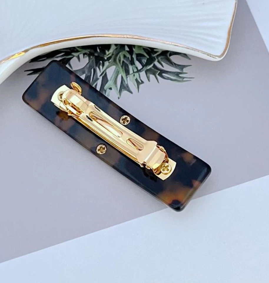 ¡Nuevo! Pinza de pelo Tory en marrón con bolsa para joyas Foto 4 de 4