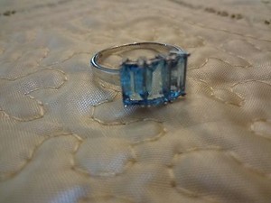 #26--TGGC STERLING SILVER RING--925--SIZE-9 1/2--3 STONES--
