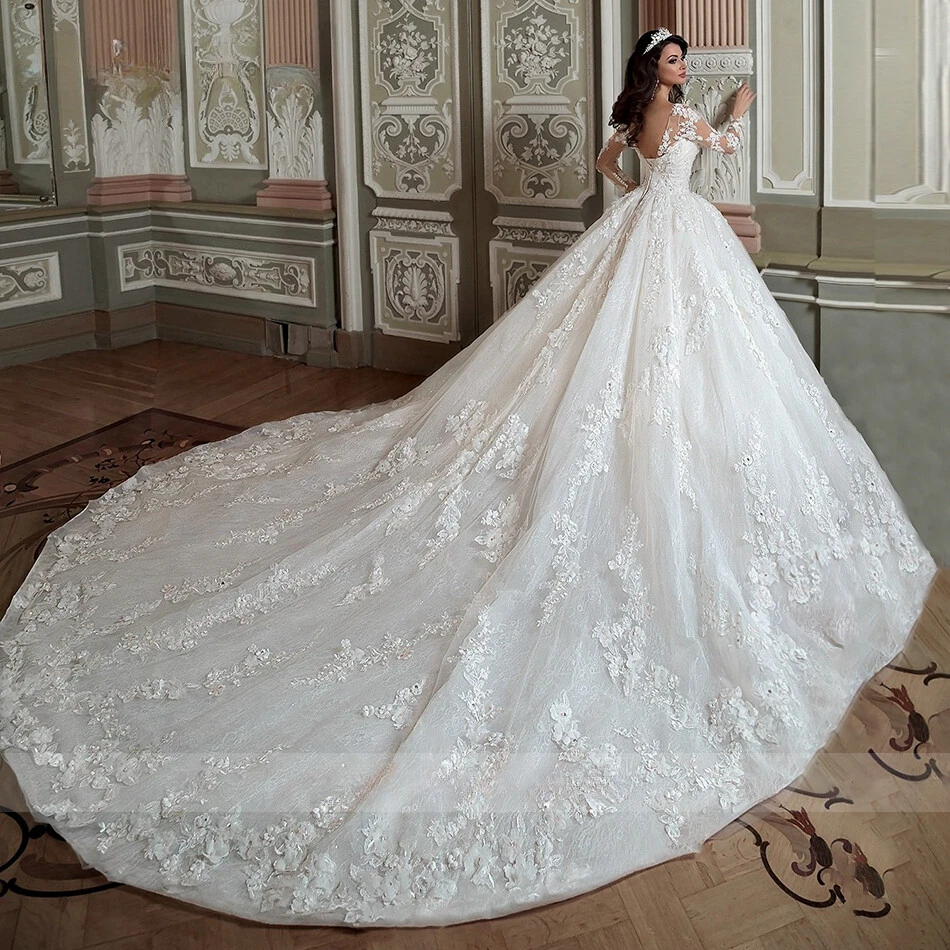 Vestidos de novia de baile de lujo mangas largas apliques con cordones vestidos de princesa novia Foto 2 de 4