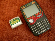 Leapfrog iQuest Learning Game Handheld Device w/ Starter Pack Cartridge FLAMES