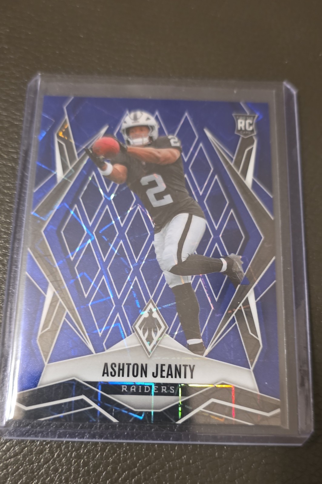 2025 Panini Phoenix - Rookies Ashton Jeanty #158 Blue Lazer /75 (RC)