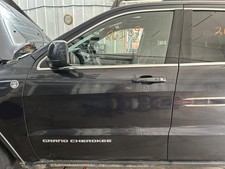 Used Front Left Door Assembly Front fits: 2014 Jeep Grand cherokee electric Fron