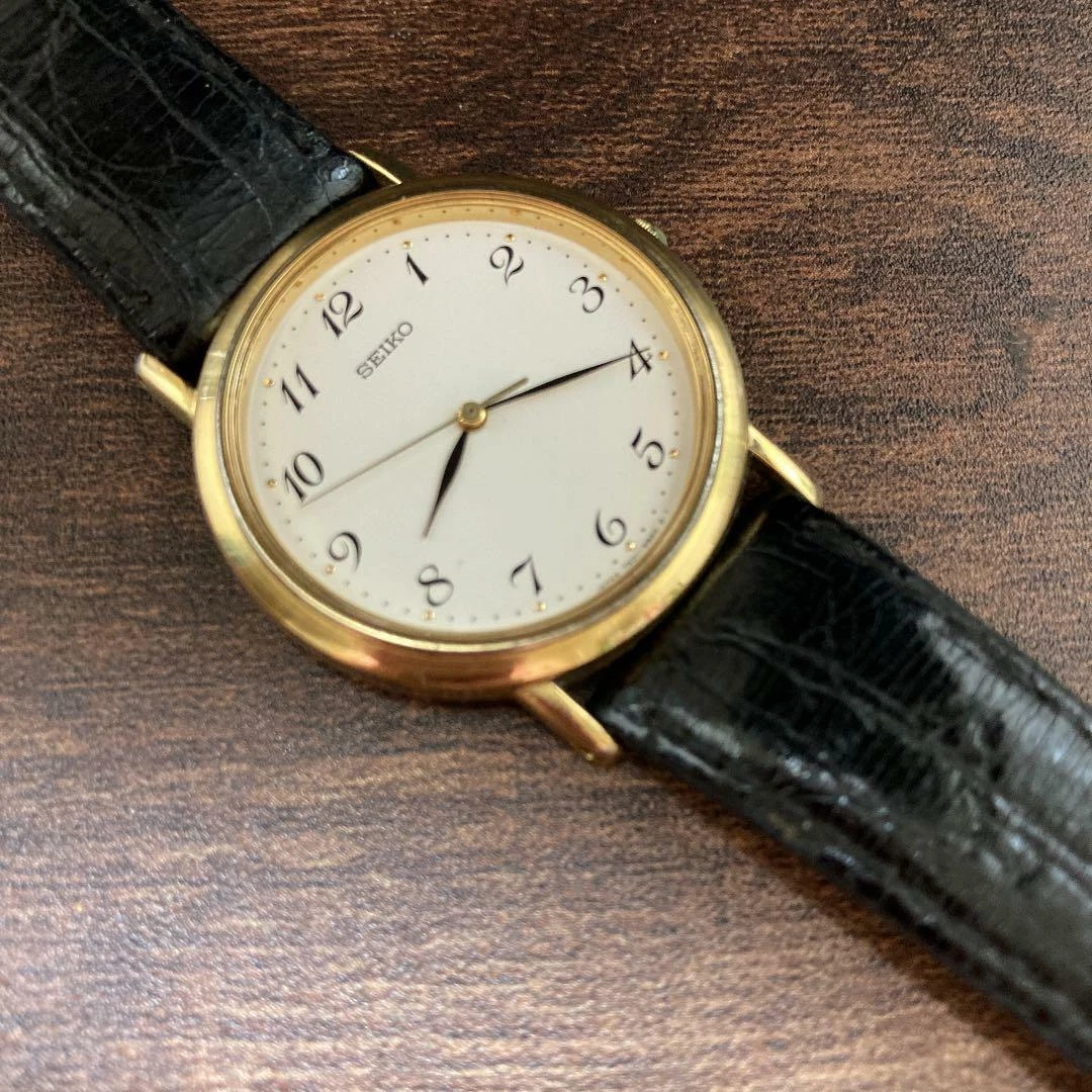 SEIKO 7N01-6B20 QUARTZ GOLD WATCH