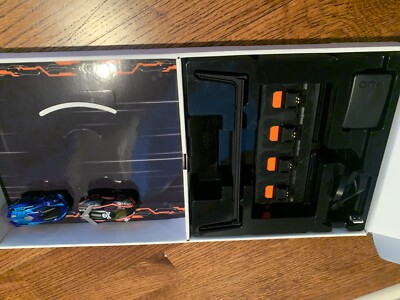 anki overdrive starter kit- 4 chargers, 2 cars, and the track