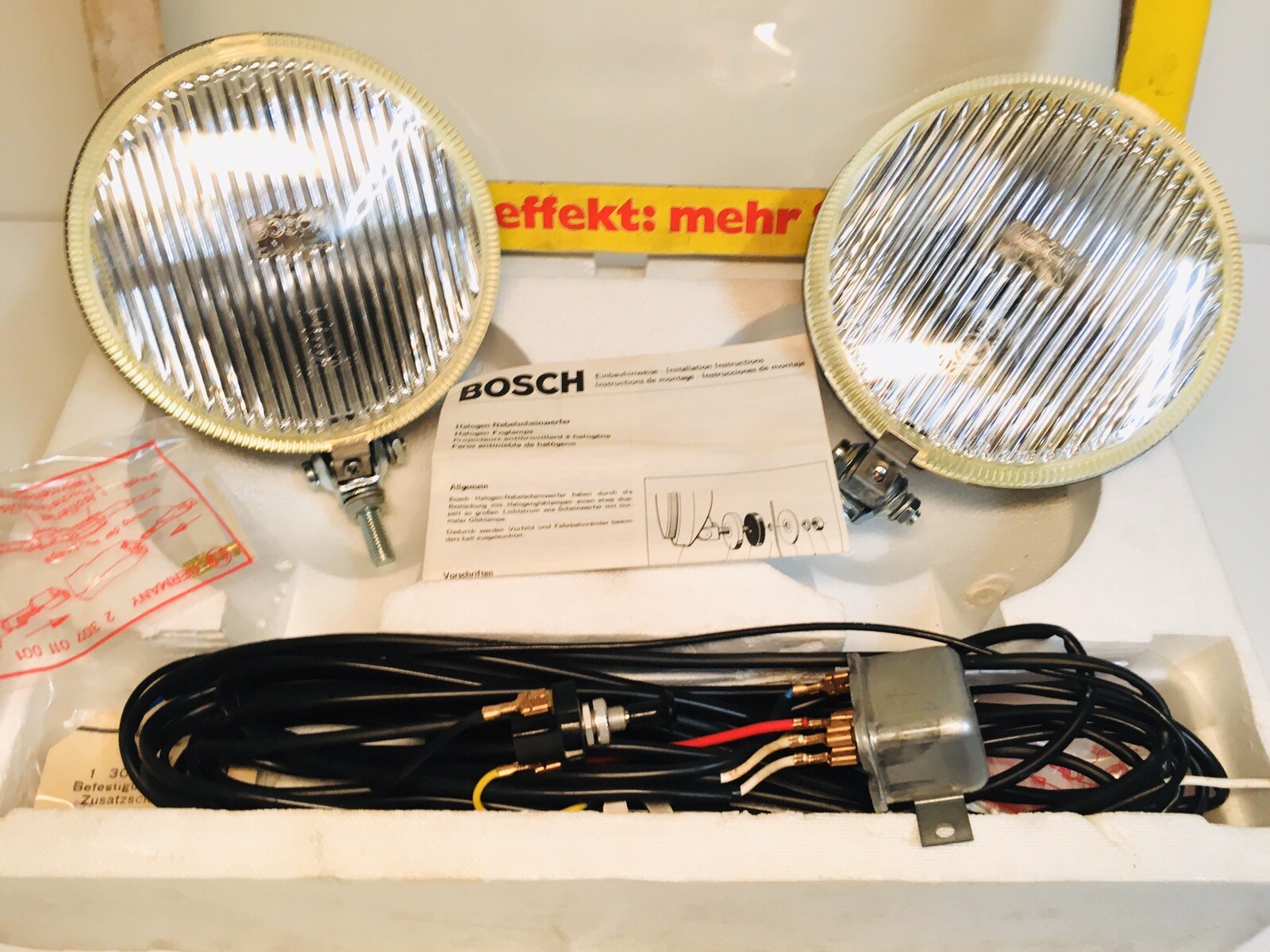 Phares antibrouillards Bosch 160 neufs avec boîtier en métal et ampoules halogènes