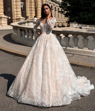 Luxury A-Line Wedding Dress Lace Appliques O-Neck Long Sleeve Beach Bridal Gowns