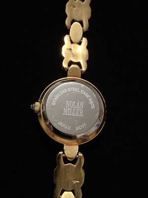 Vintage Nolan Miller Gold Tone Ladies Watch With Blue 