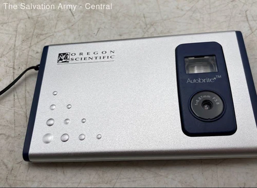 Oregon Scientific DS6618 Silver World's Thinnest Digital Point & Shoot Camera