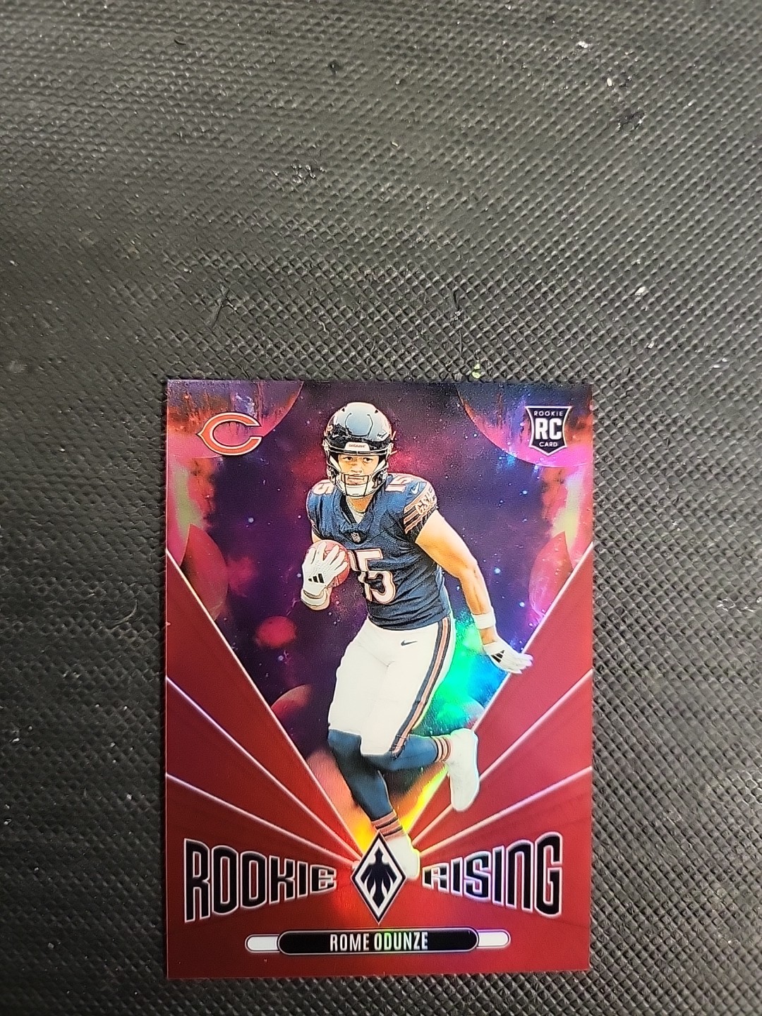 2024 Panini Phoenix - Rookie Rising Rome Odunze #RR-ROE Red /99 (RC)