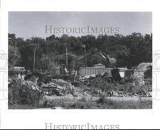 Press Photo Excavators clean up site at Geneva Industries Inc., Houston