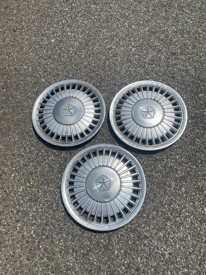 Factory 1984 to 1986 Plymouth Caravelle Voyager LeBaron 14 inch hubcaps - Image 2 of 4