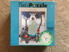 750 Piece Ceaco Plant a Puzzle One Touch Of Nature Makes The Whole World Kin NEW