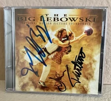 “THE BIG LEBOWSKI” SOUNDTRACK CD SIGNED BY JEFF BRIDGES & JOHN TURTURRO