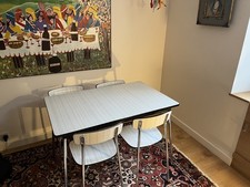Tavo 1950s melamine and chromed dining table and four chairs
