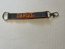 Daniel Embroidered Name Strap Key Rings Keychains with Clasp gray and orange