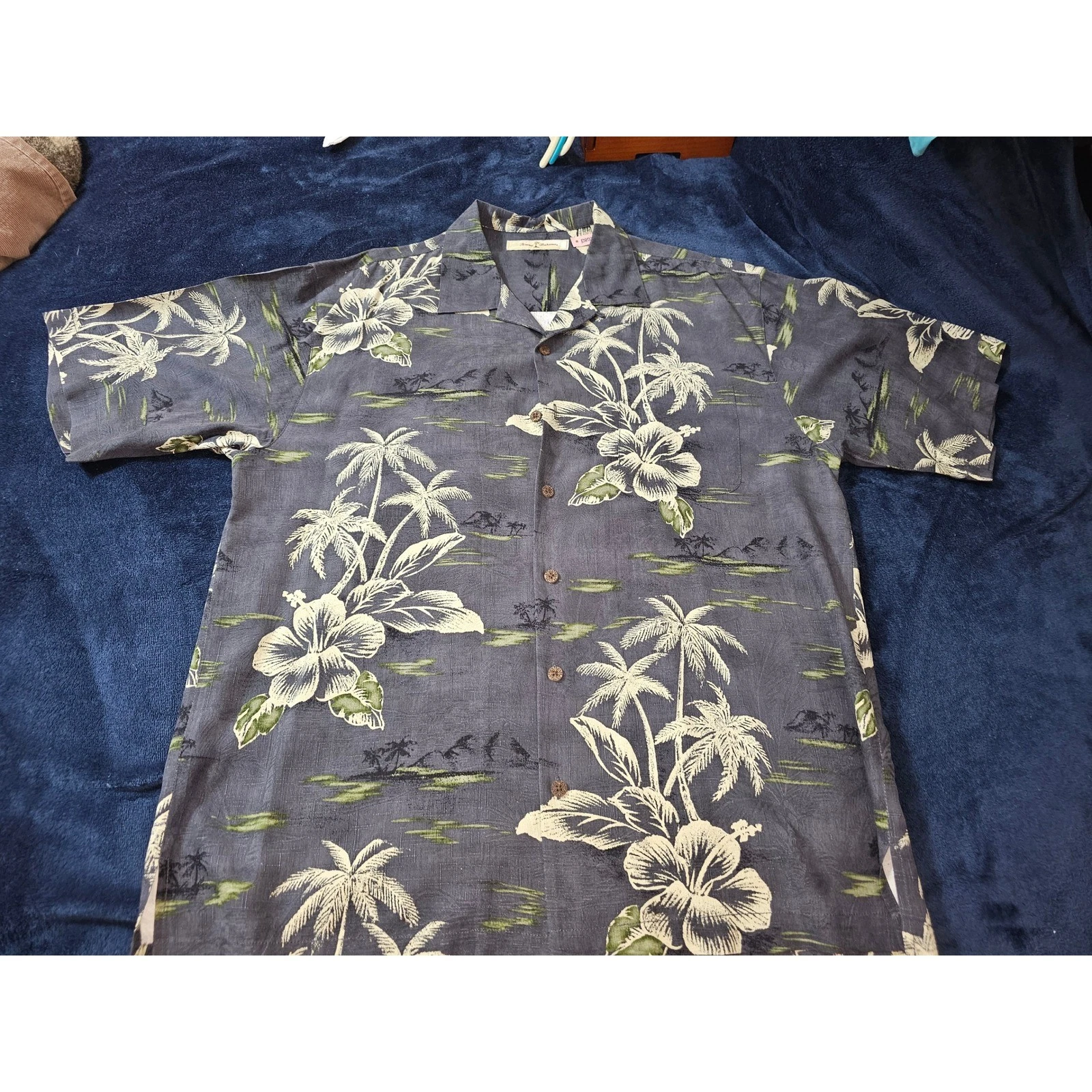Tommy Bahama men's button-up shirt features a tropical Hawaiian floral print