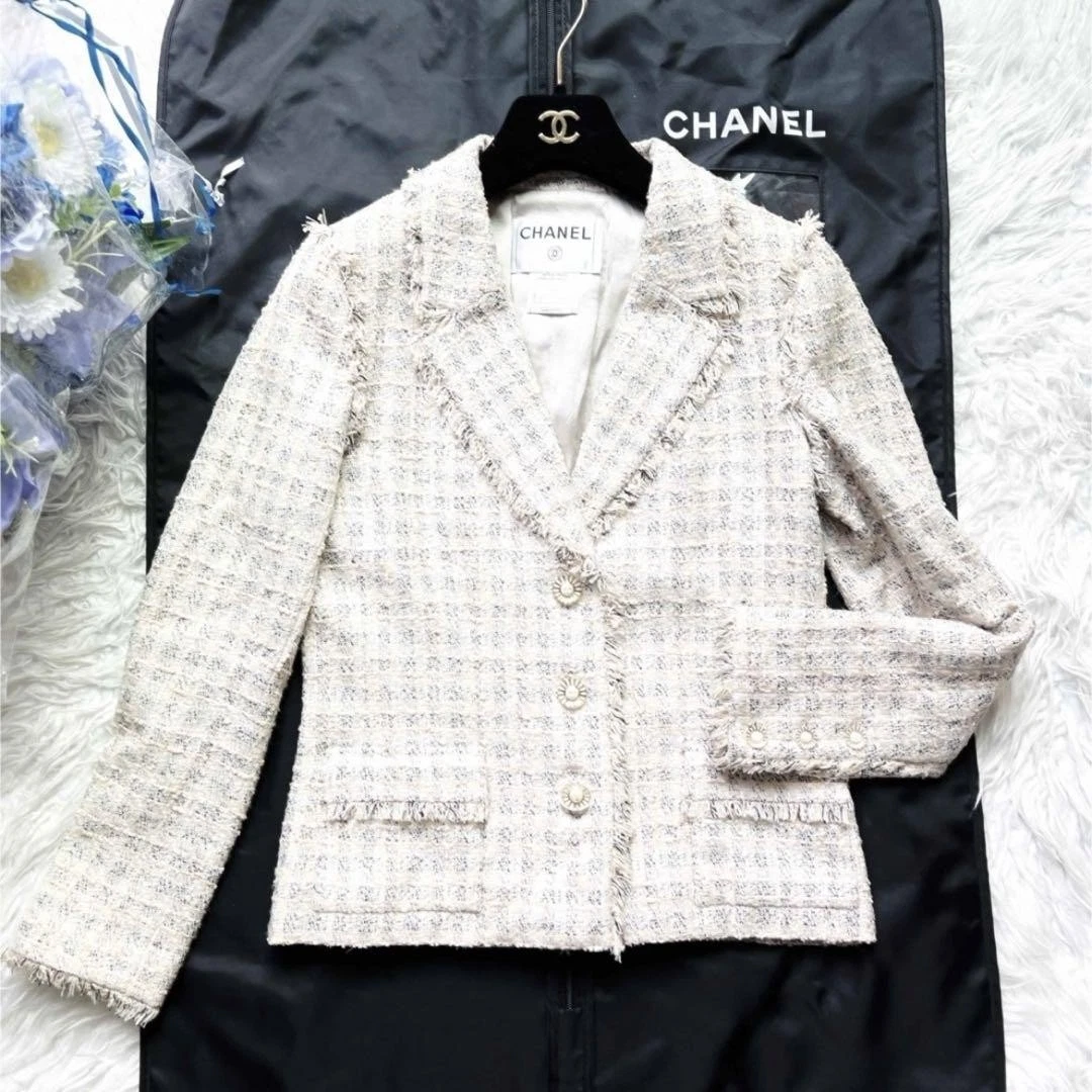 Giacca Chanel Gripore tweed pastello con cura