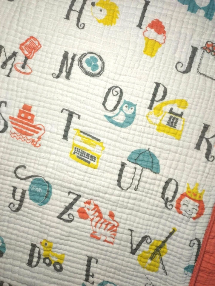 Manta bebé muselina letras alfabeto algodón orgánico trébol y salvia naranja blanco Foto 4 de 4