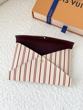 Newlouis Vuitton 2025 Grace Coddington Cartogram Kirigami Pochette - Medium Newlouis Vuitton 2025 Grace Coddington Cartogram Kirigami Pochette - Medium