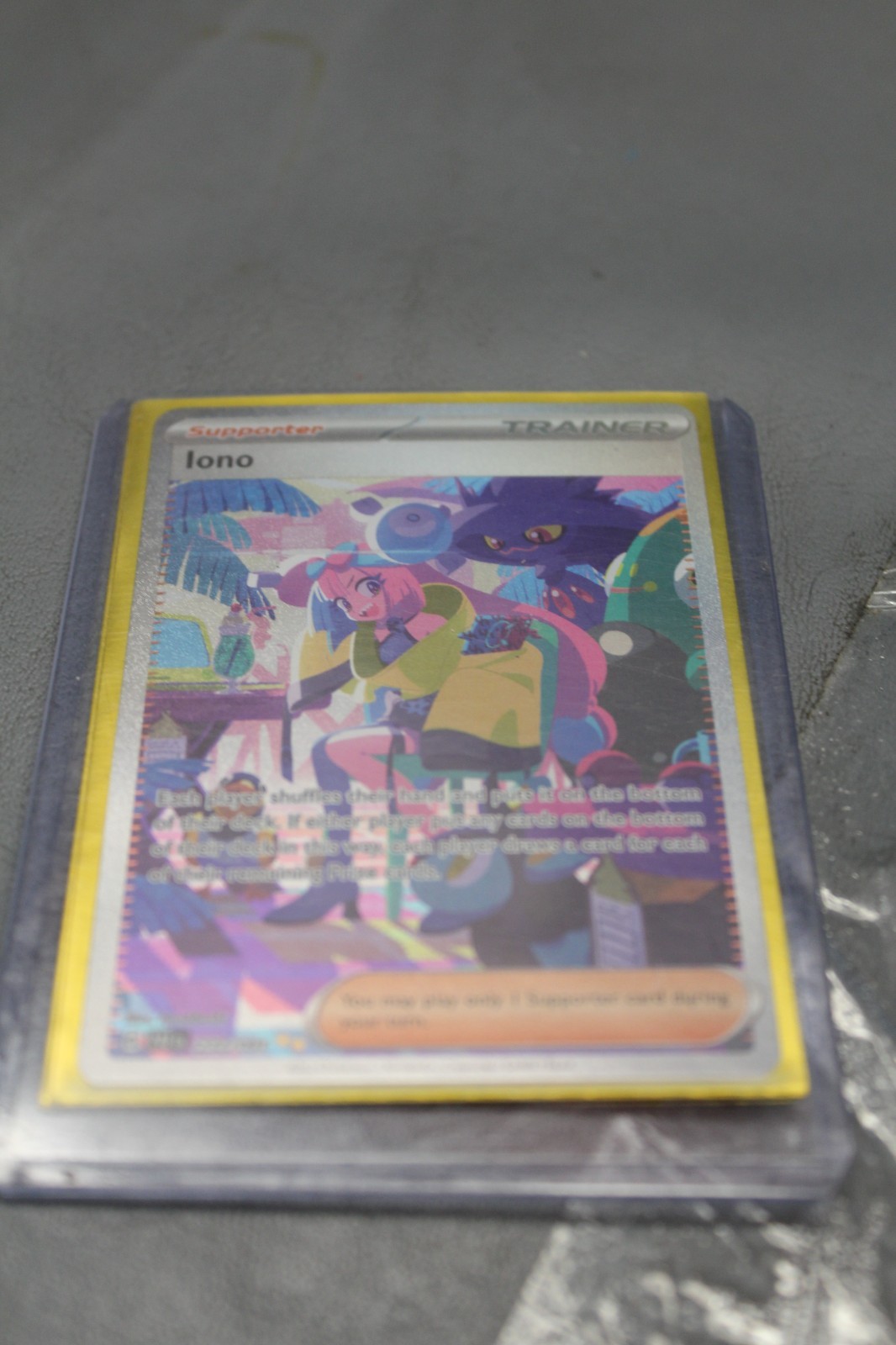 Paldean Fates Iono 237/091 SIR NM