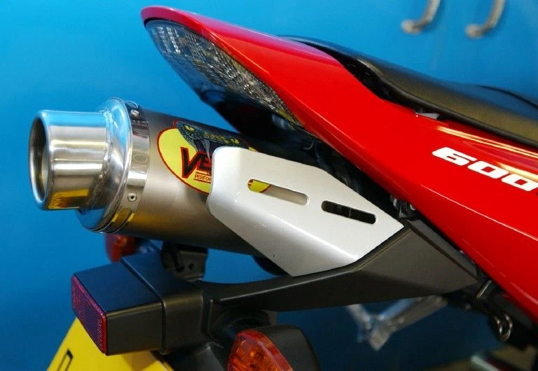 Universal Carbon Fiber oval muffler with Titanium ends under seat design - image 2 of 2