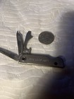 Suring Wis Fingernail File Knife Bottle Opener — photo 1