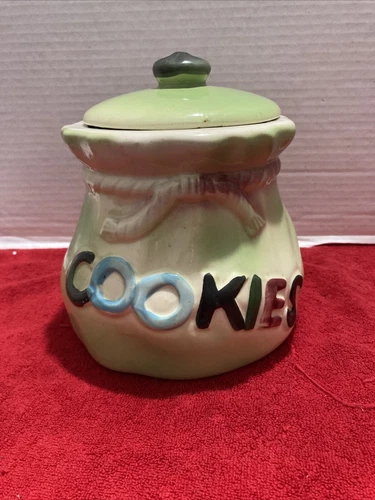 Vintage Green ceramic cookie jar labeled 'COOKIES' USA.