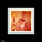 Square Color Photo WOMAN SITTING IN CHAIR READING NEWSPAPER