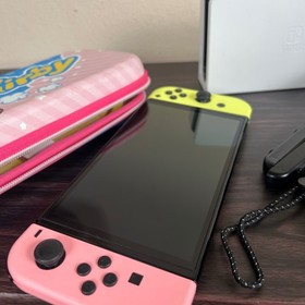 Nintendo Switch OLED Console Neon Pink Yellow JoyCon Dock Kirby Case Bundle