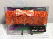 WEDDING OR PROM GARTERS New in plastic casing ORANGE WITH ORANGE BOW