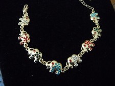GOLD TONE MULTI COLORED RHINESTONES ELEPHANTS 6'' L 3/8'' W BRACELET  28/26