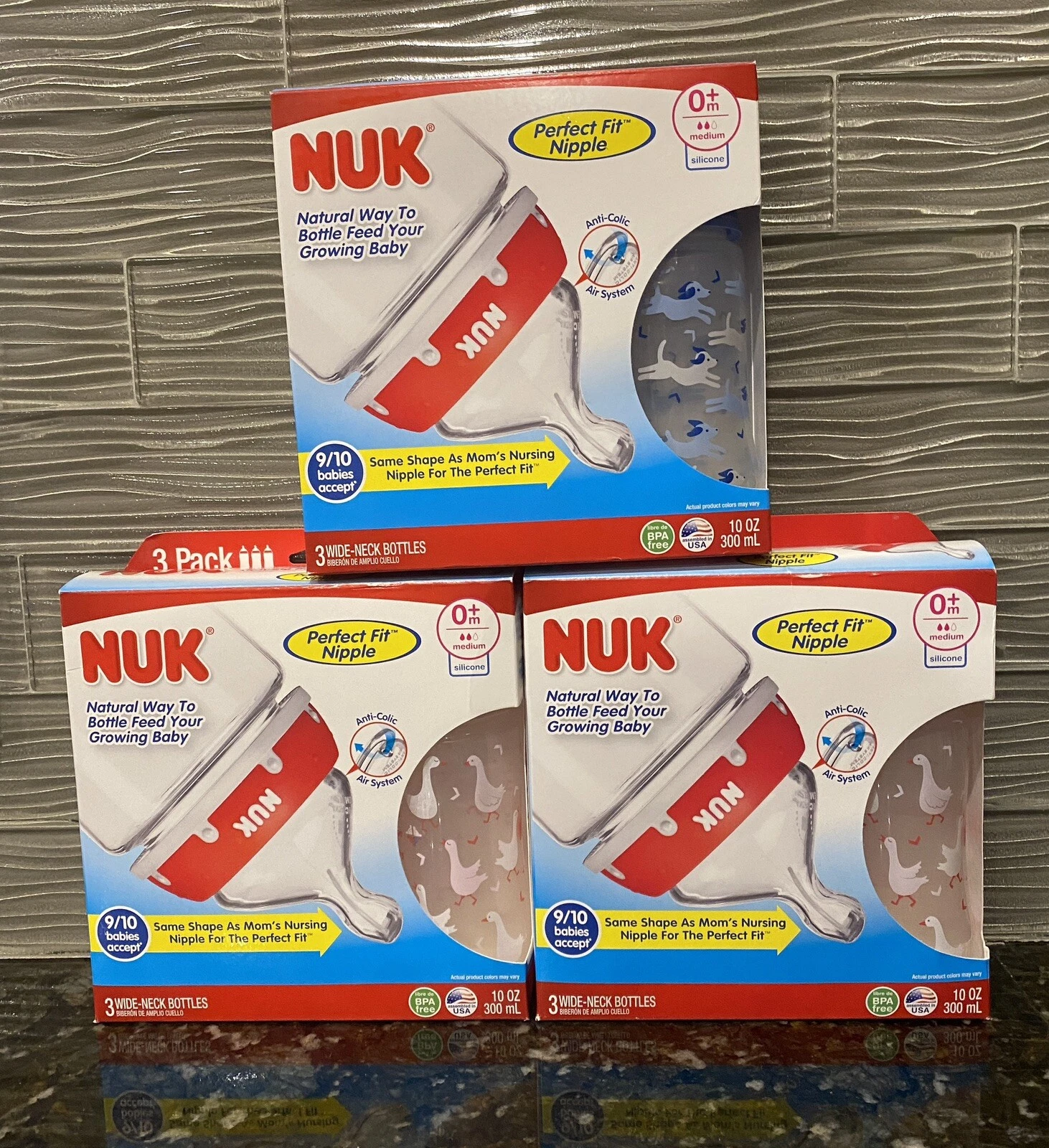 NEW 3 boxes NUK Bottles 0+m Medium Flow Anti Colic 10 Oz (9 bottles) Ducks Dogs