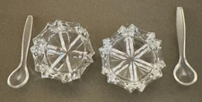 2 PRESSED GLASS SALT CELLARS WITH SPOONS
